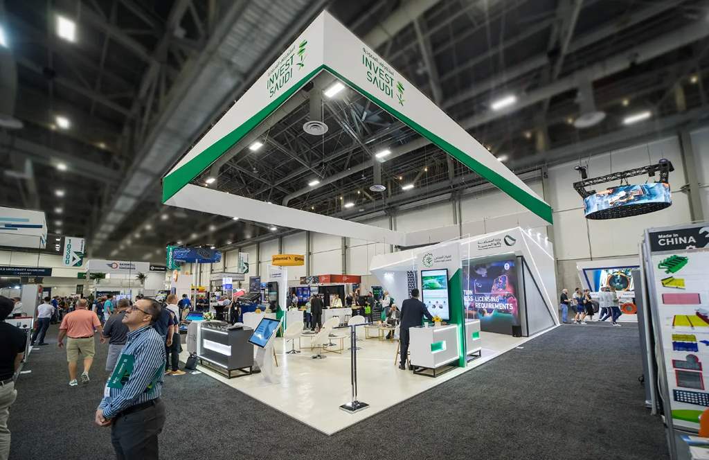 Woodworking industry professionals networking at trade show